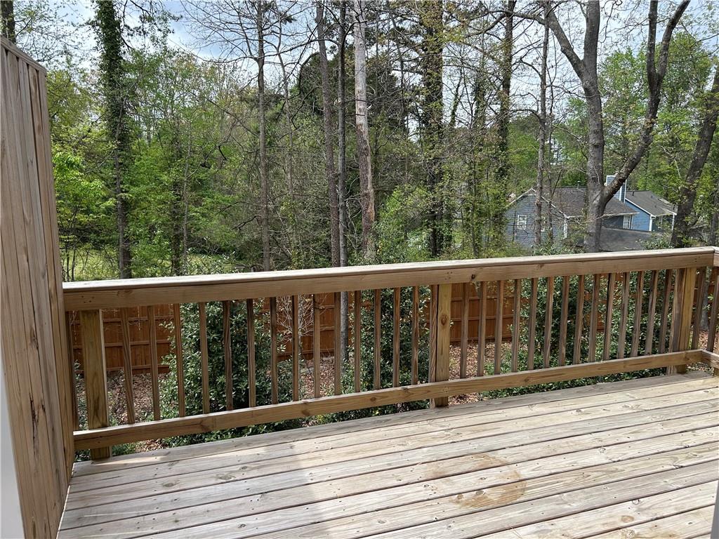 3715 Davis Circle Duluth, GA 30096 - Photo 20 of 20 a view of a wooden balcony and trees