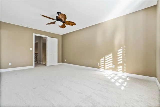 a view of empty room with windows