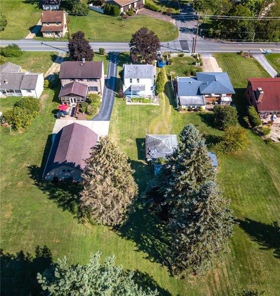 161 Highway 68 Rochester, PA 15074 - Photo 3 of 18 Yes the yard extends this far back and more. Picture perfect sunsets can be watched from this vantage point in your backyard.