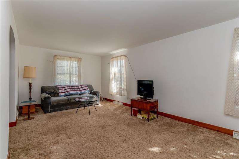 161 Highway 68 Rochester, PA 15074 - Photo 8 of 18 Freshly painted living room has lots of natural light.