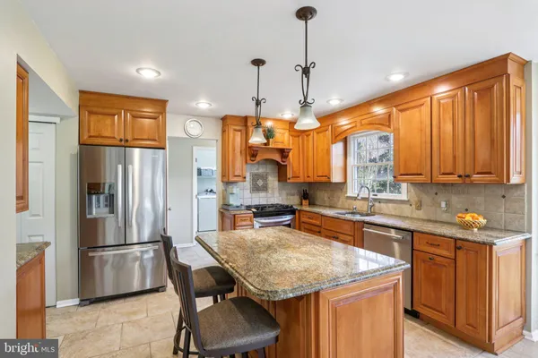 a bathroom with a toilet and a sink