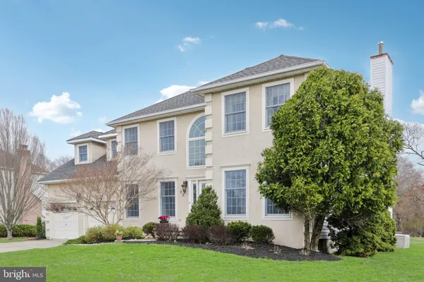 an aerial view of a house with a garden