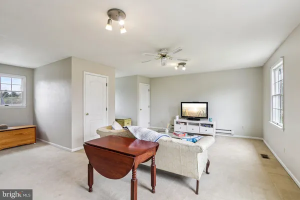 an aerial view of a house with a garden