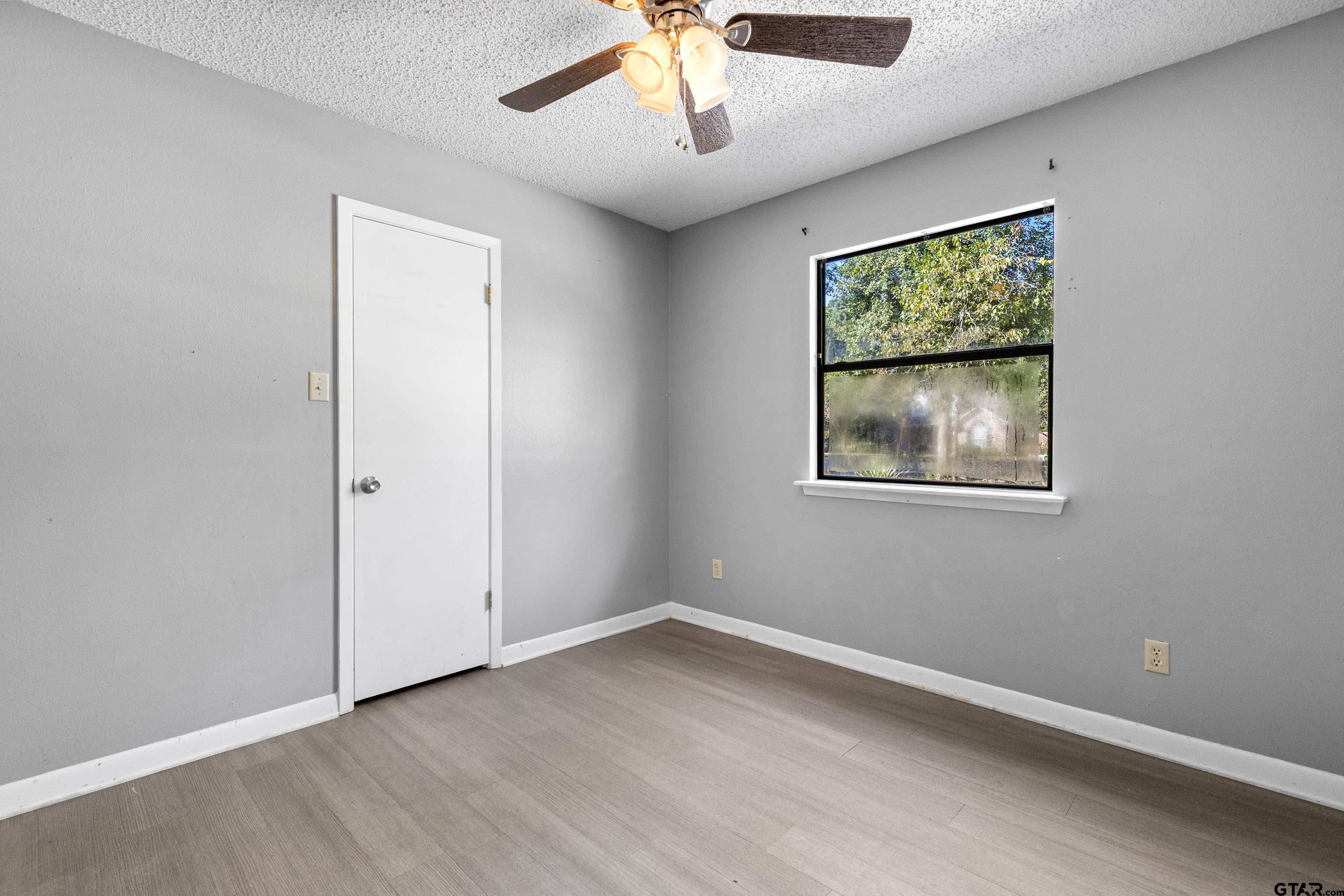 473 Meadow View Path Holly Lake Ranch, TX 75765 - Photo 24 of 37 a view of an empty room with a window