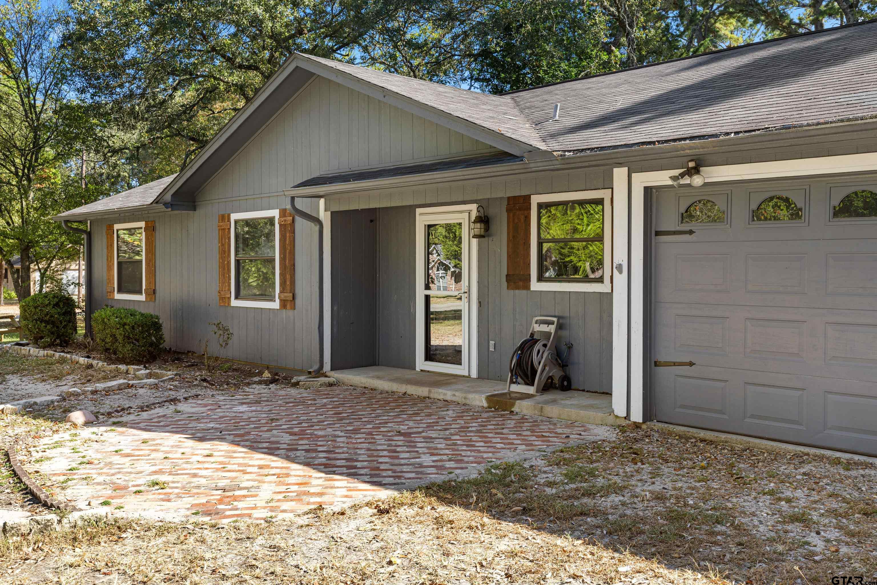473 Meadow View Path Holly Lake Ranch, TX 75765 - Photo 8 of 37 a view of a house with backyard