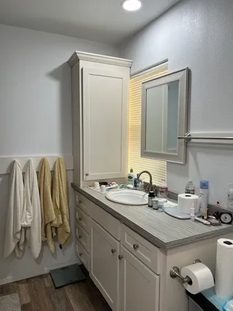 a bathroom with a sink and a tub