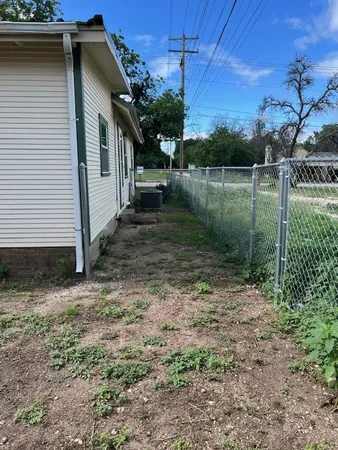 a view of a porch with wooden floor and outdoor space