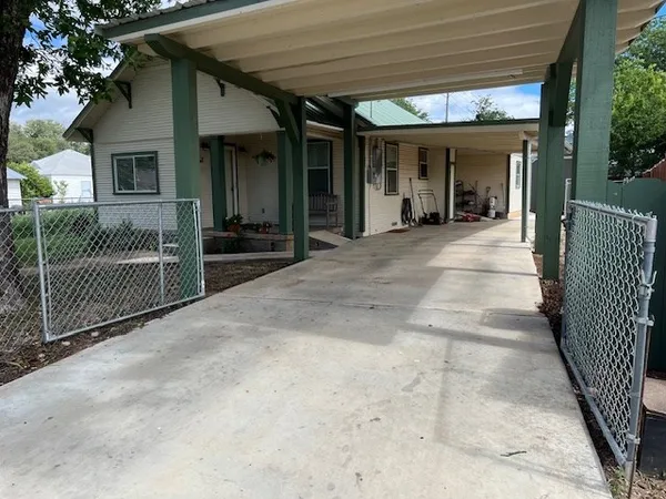 a view of a lounge chairs in the patio