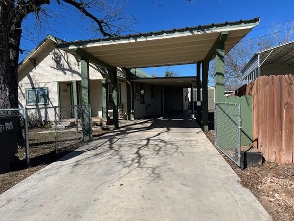 a view of a building with sitting area