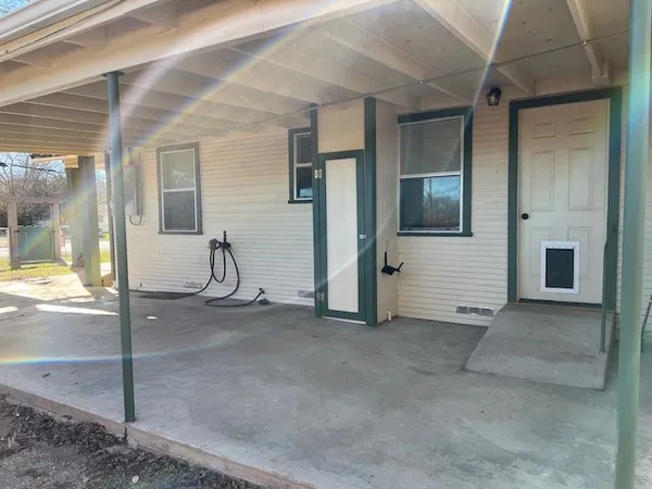 a view of a house with a porch