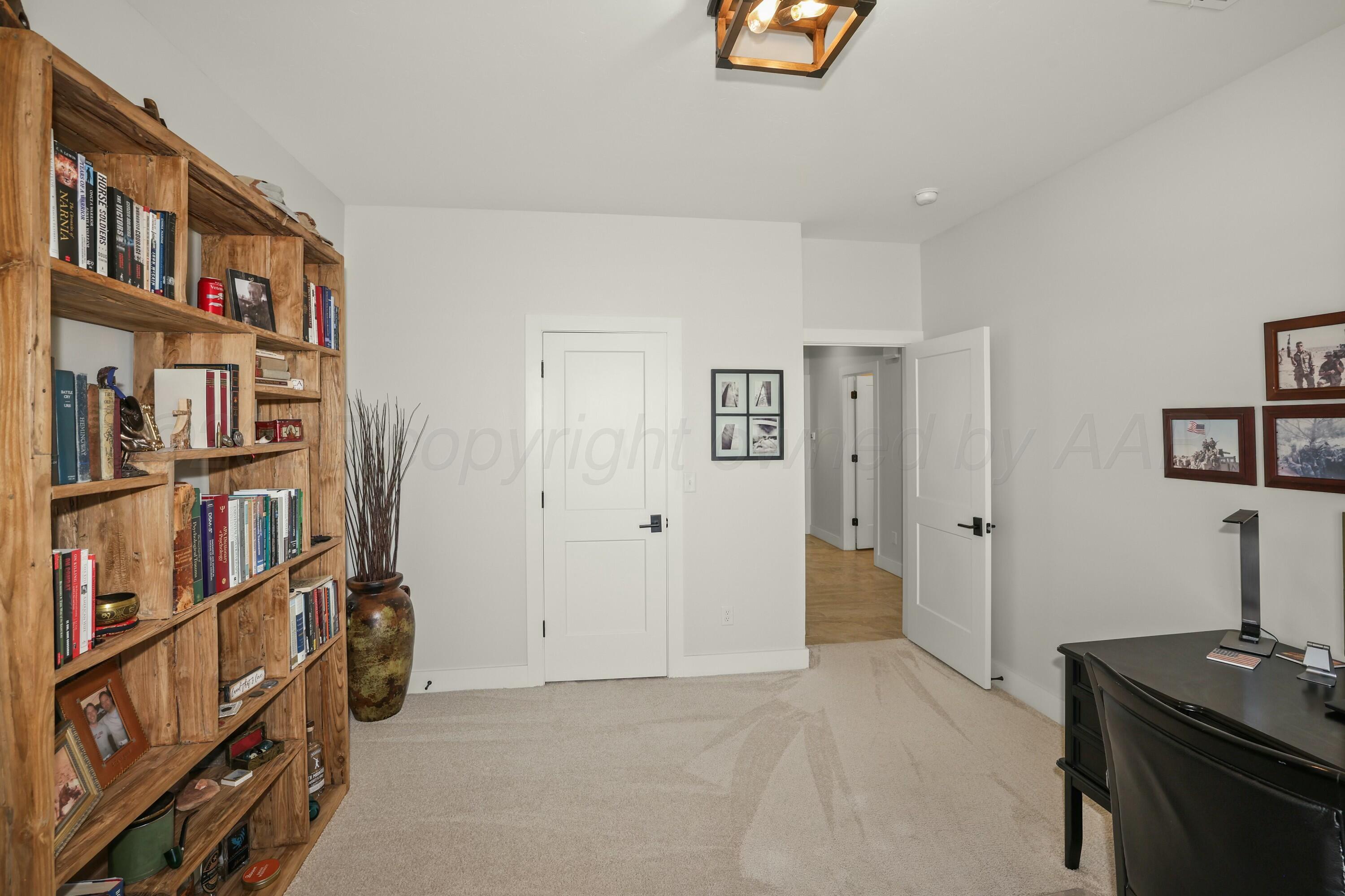 19081 Elk Springs Road Amarillo, TX 79119 - Photo 28 of 41 a view of a livingroom with furniture and staircase