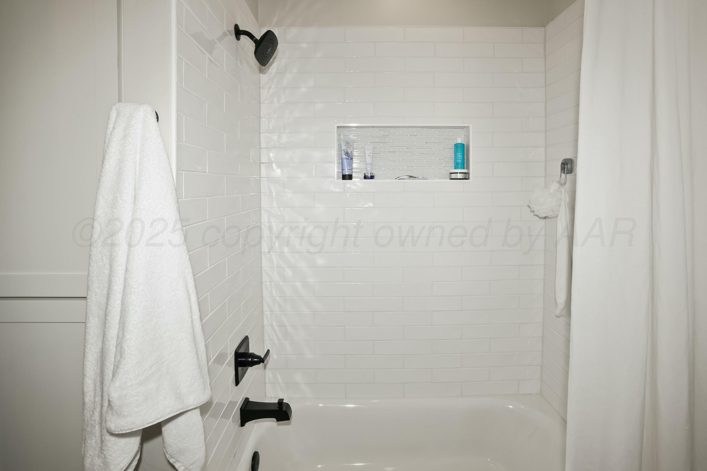 19081 Elk Springs Road Amarillo, TX 79119 - Photo 35 of 41 a bathroom with a shower