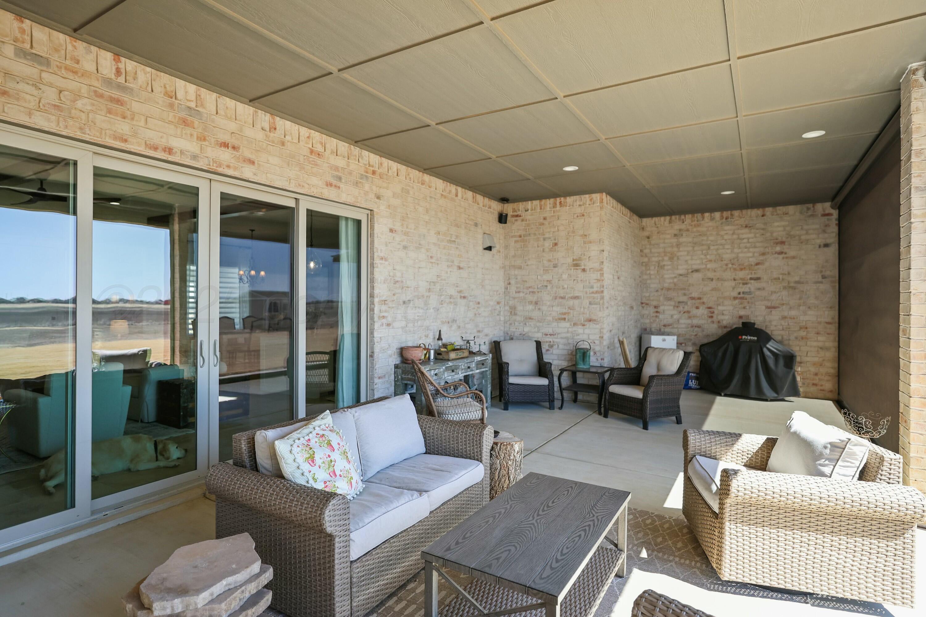 19081 Elk Springs Road Amarillo, TX 79119 - Photo 37 of 41 a outdoor living space with furniture
