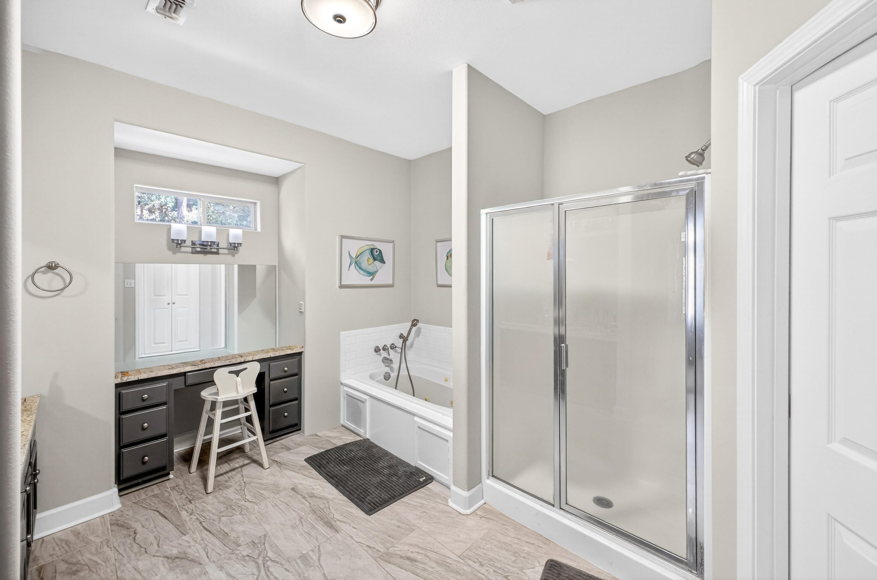 56 East Shallows Drive Santa Rosa Beach, FL 32459 - Photo 17 of 54 a spacious bathroom with a shower and a sink