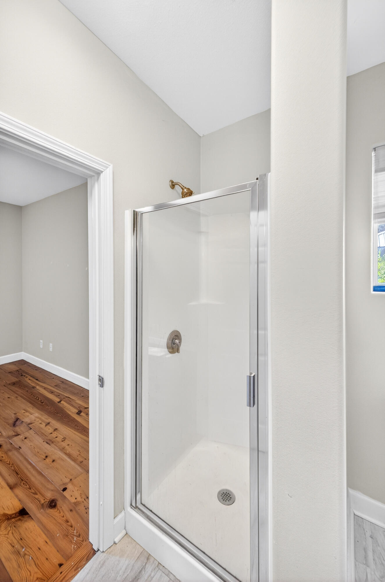 56 East Shallows Drive Santa Rosa Beach, FL 32459 - Photo 22 of 54 a bathroom with a glass shower door