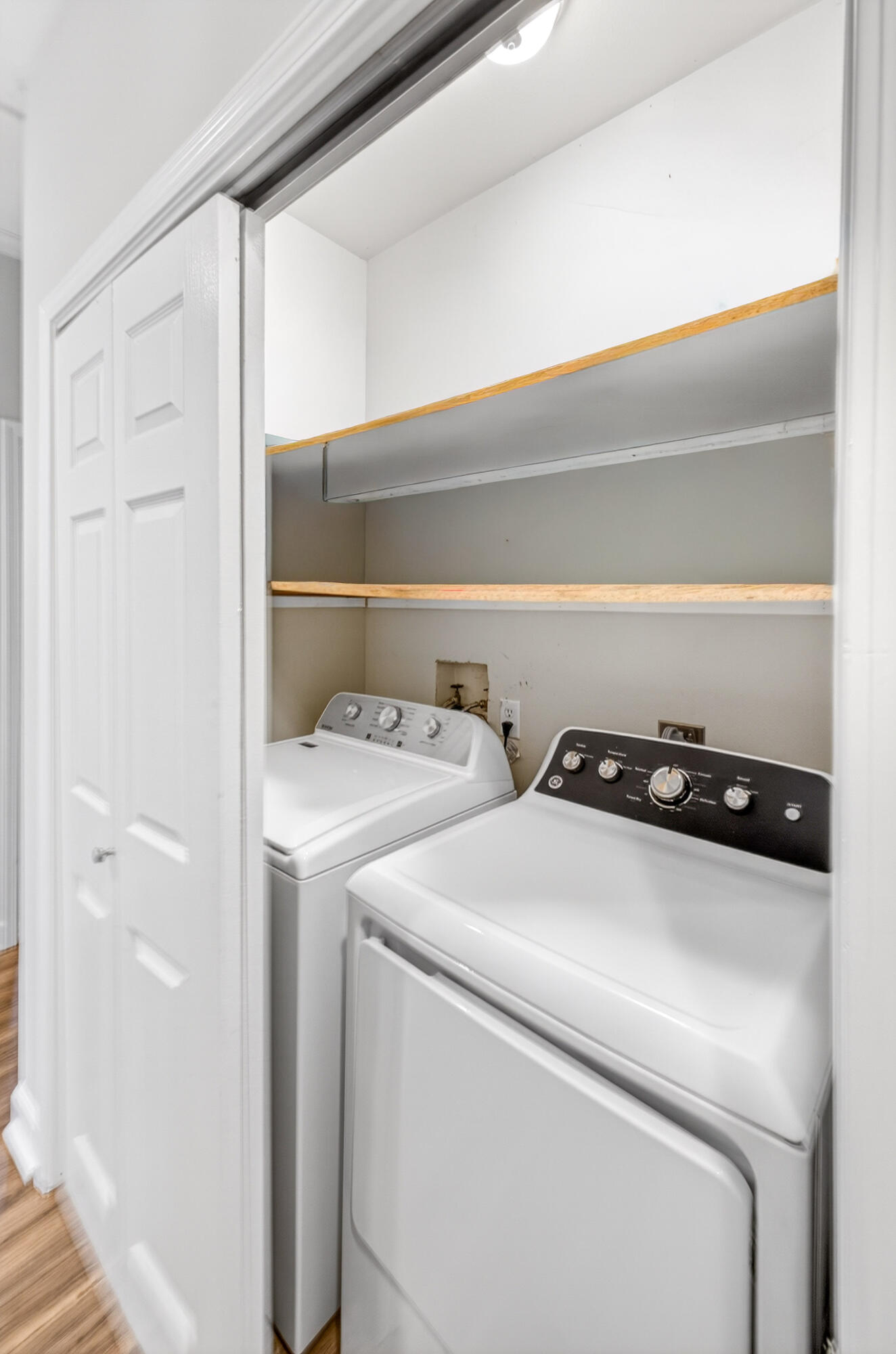 56 East Shallows Drive Santa Rosa Beach, FL 32459 - Photo 25 of 54 a utility room with dryer and washer