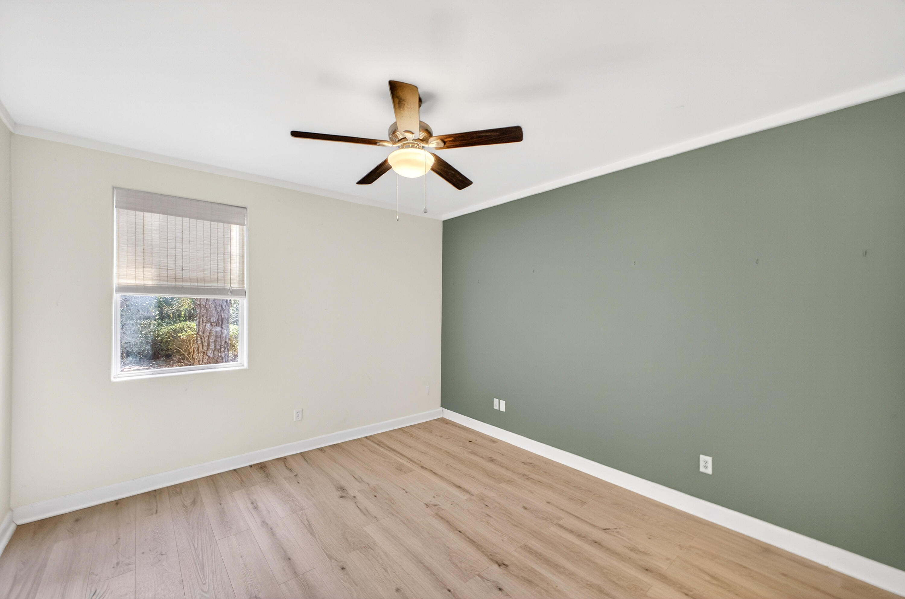 56 East Shallows Drive Santa Rosa Beach, FL 32459 - Photo 26 of 54 wooden floor in an empty room with a window