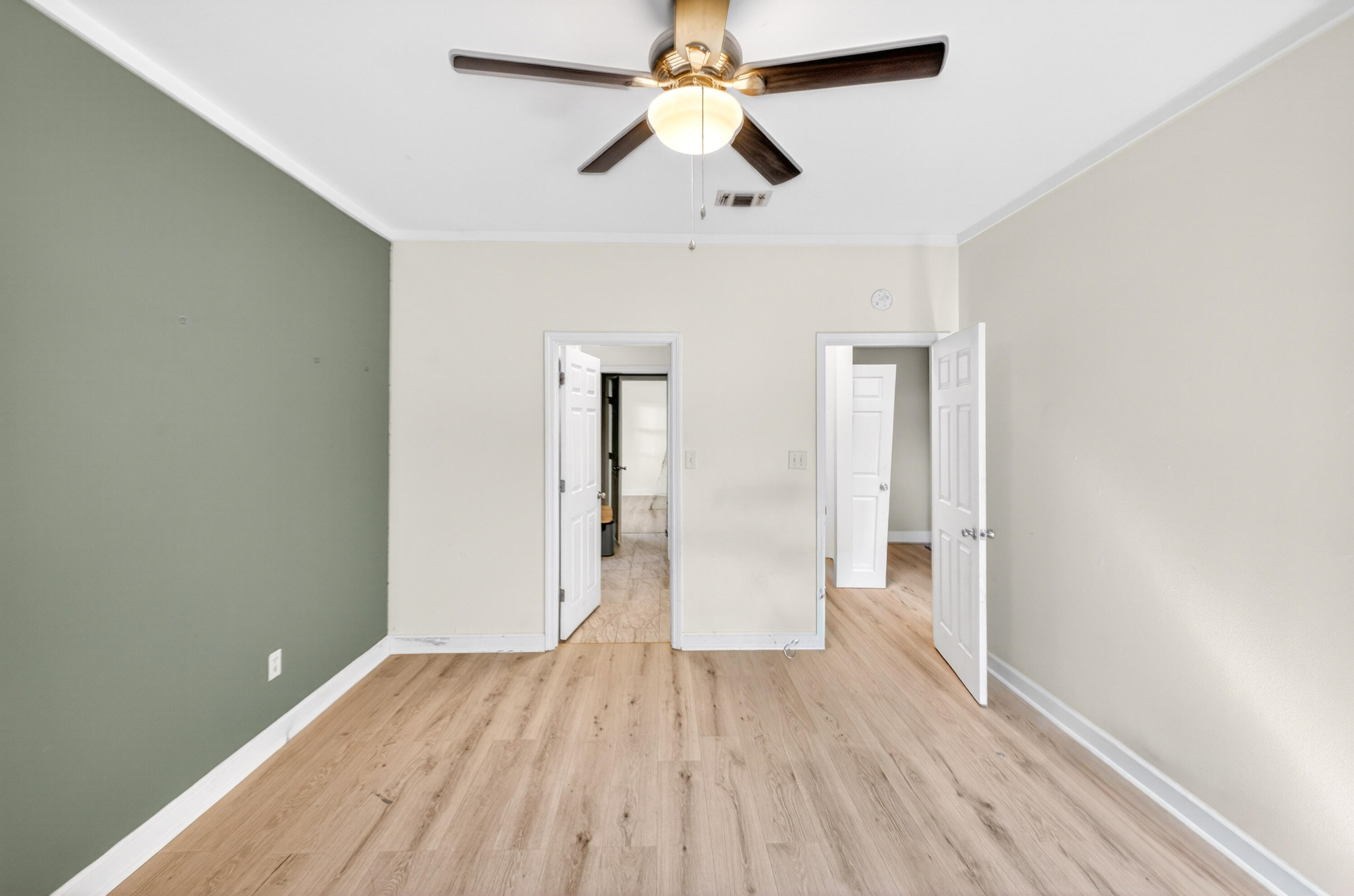 56 East Shallows Drive Santa Rosa Beach, FL 32459 - Photo 27 of 54 a view of empty room with wooden floor