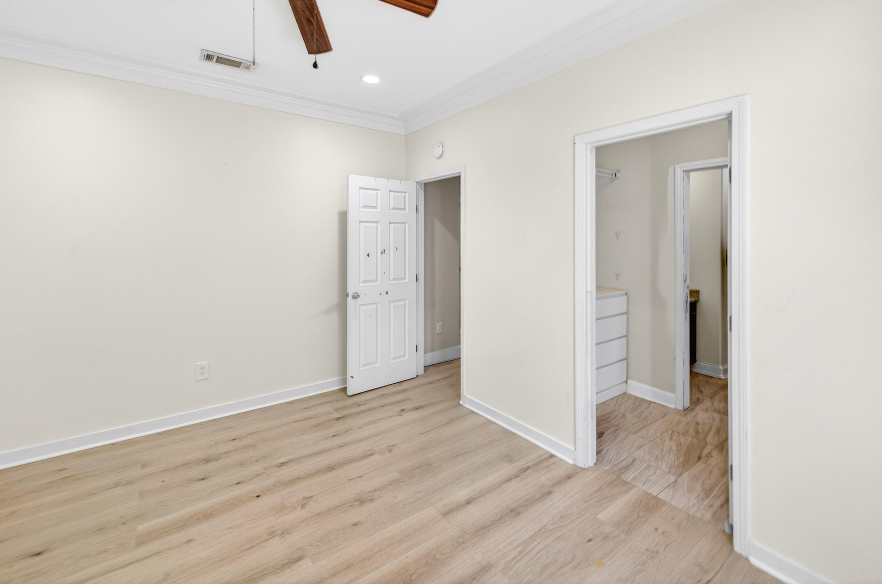 56 East Shallows Drive Santa Rosa Beach, FL 32459 - Photo 30 of 54 an empty room with wooden floor and closet