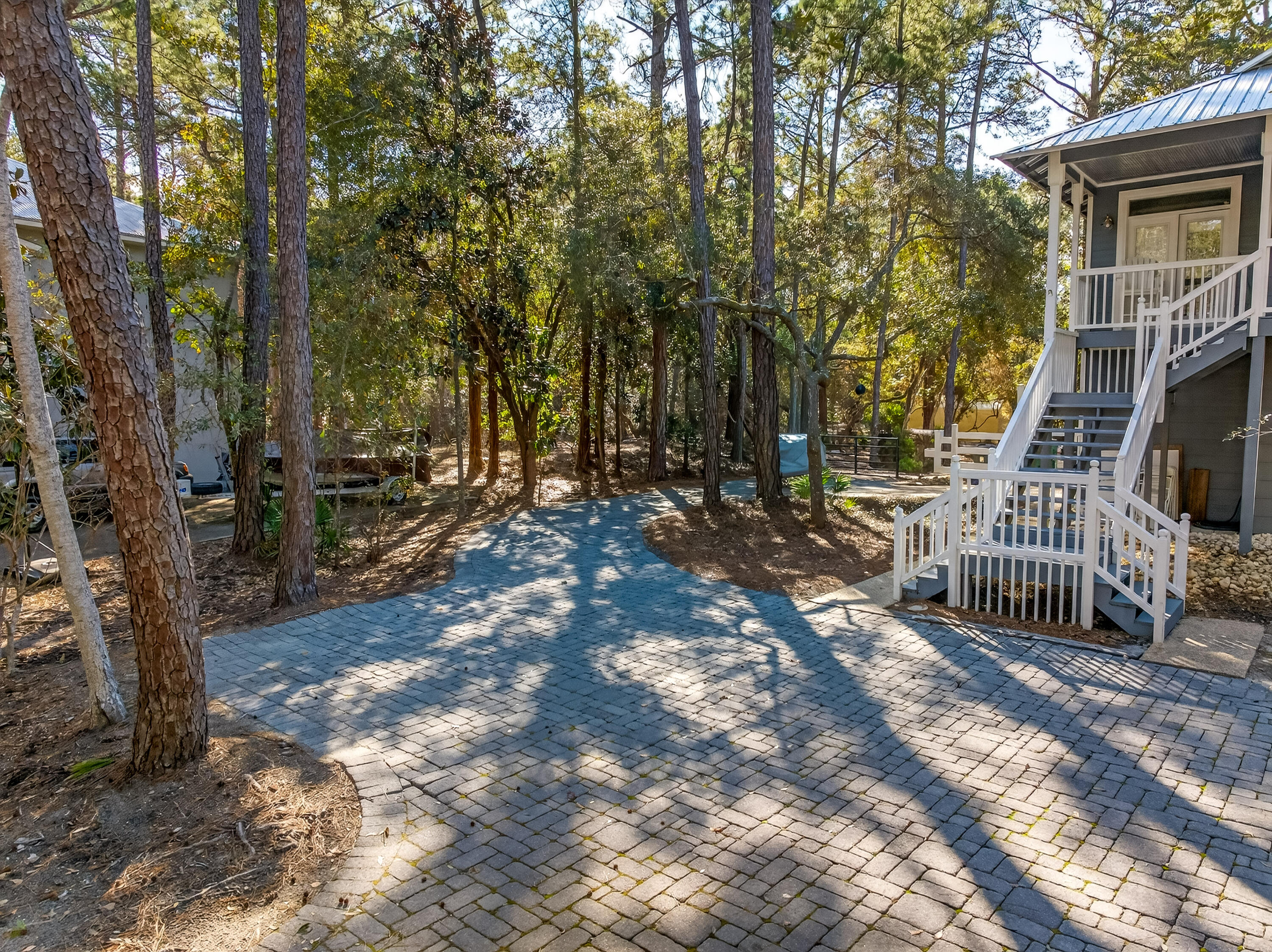 56 East Shallows Drive Santa Rosa Beach, FL 32459 - Photo 34 of 54 a view of outdoor space with deck and a backyard