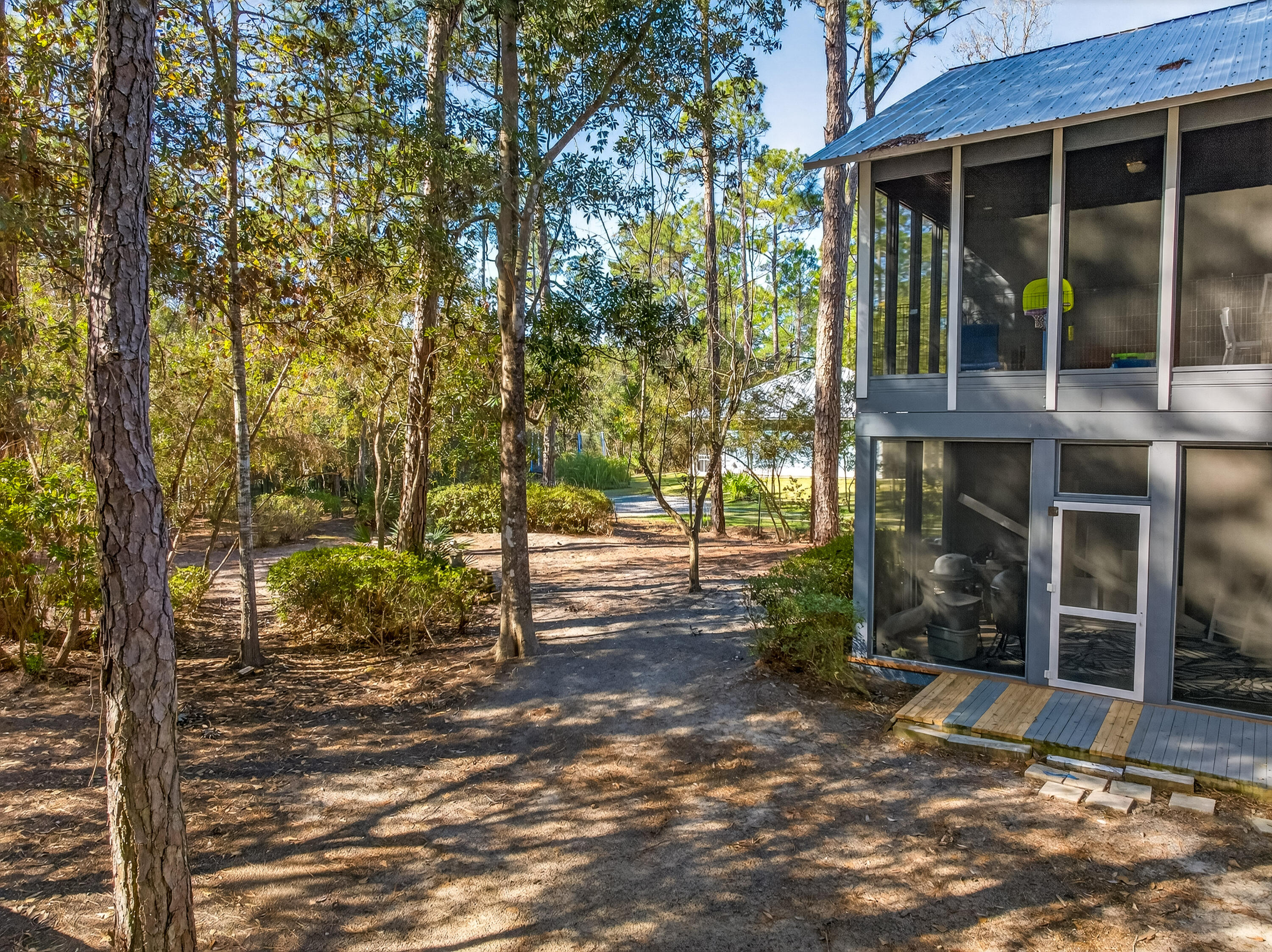 56 East Shallows Drive Santa Rosa Beach, FL 32459 - Photo 37 of 54 a view of a house with backyard