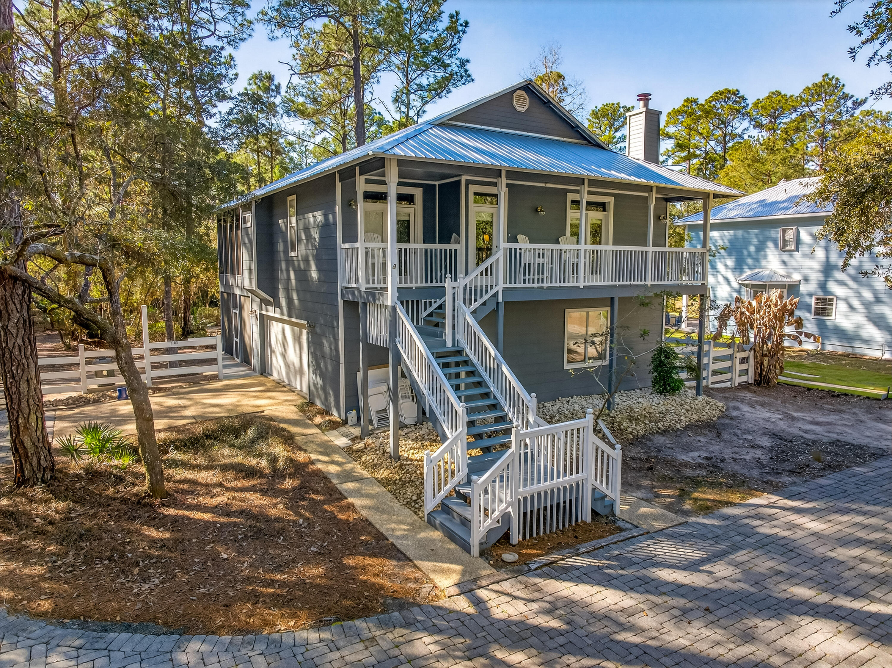 56 East Shallows Drive Santa Rosa Beach, FL 32459 - Photo 39 of 54 a front view of a house with a yard