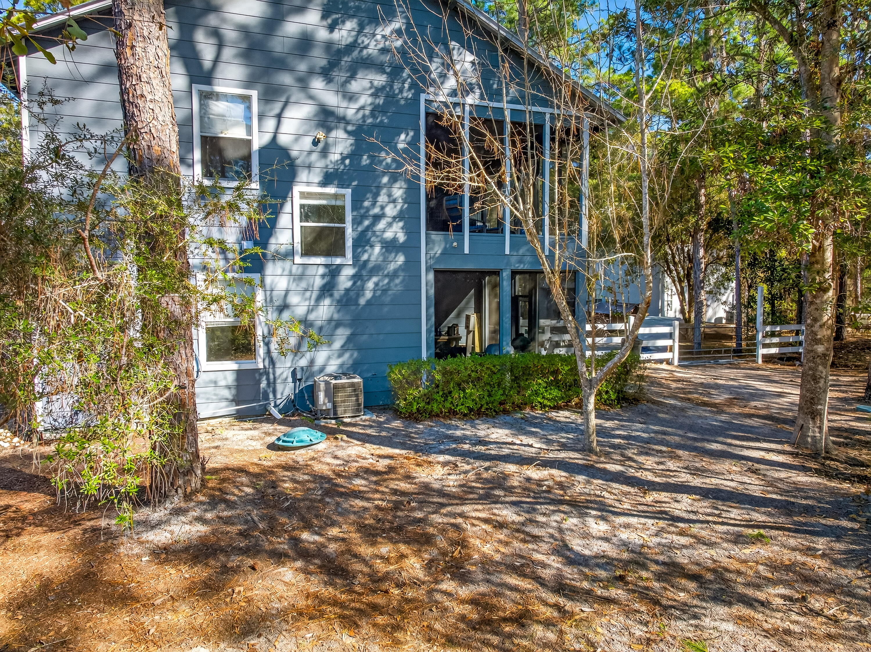 56 East Shallows Drive Santa Rosa Beach, FL 32459 - Photo 51 of 54 a front view of a house with a yard