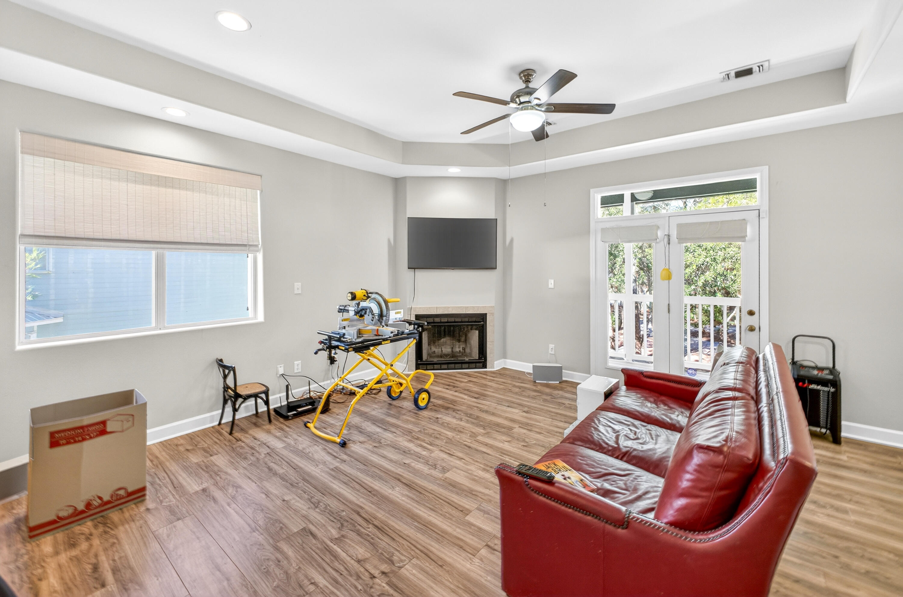 56 East Shallows Drive Santa Rosa Beach, FL 32459 - Photo 8 of 54 a living room with furniture a fireplace and a flat screen tv