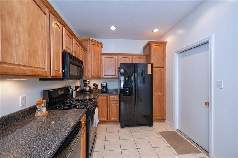 302 Saddlebrook Road Gibsonia, PA 15044 - Photo 10 of 25 Kitchen View with Garage Door to Right