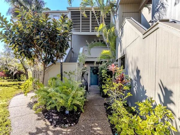 a view of a back yard of the house