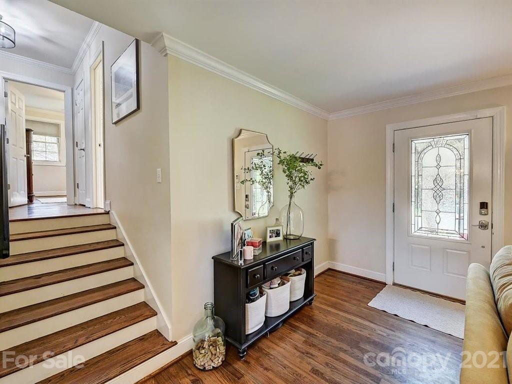 5121 Murrayhill Road Charlotte, NC 28210 - Photo 3 of 47 a view of a room with wooden floor and windows