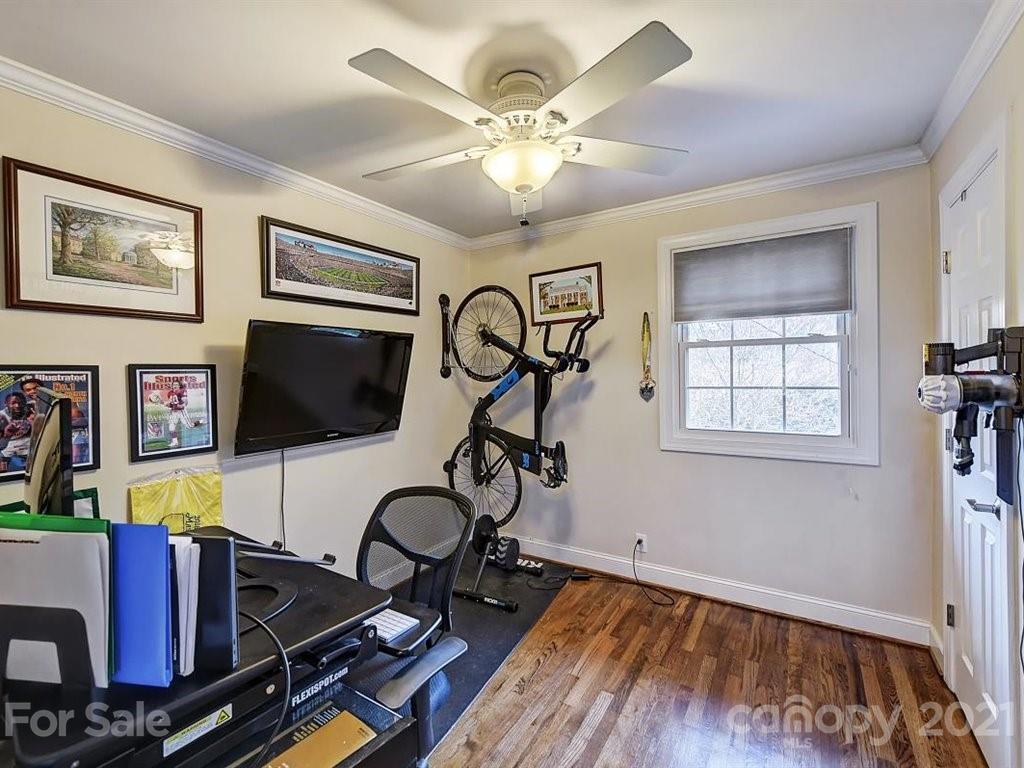 5121 Murrayhill Road Charlotte, NC 28210 - Photo 21 of 47 a living room with furniture and a flat screen tv