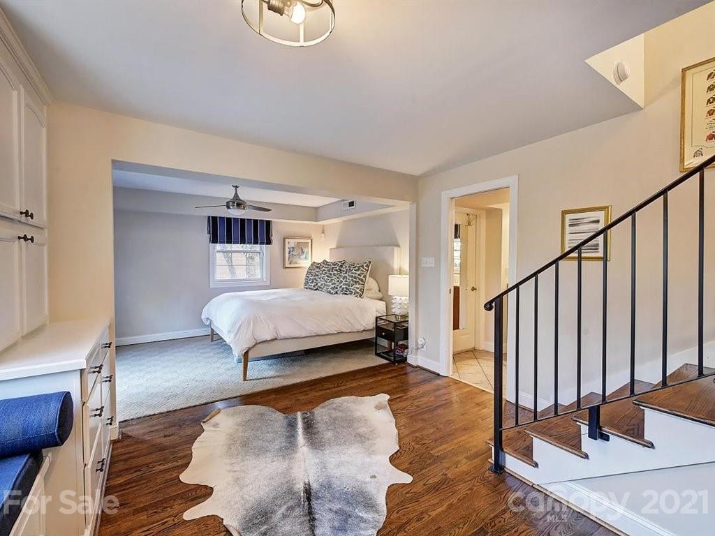5121 Murrayhill Road Charlotte, NC 28210 - Photo 23 of 47 a bedroom with a bed and a window