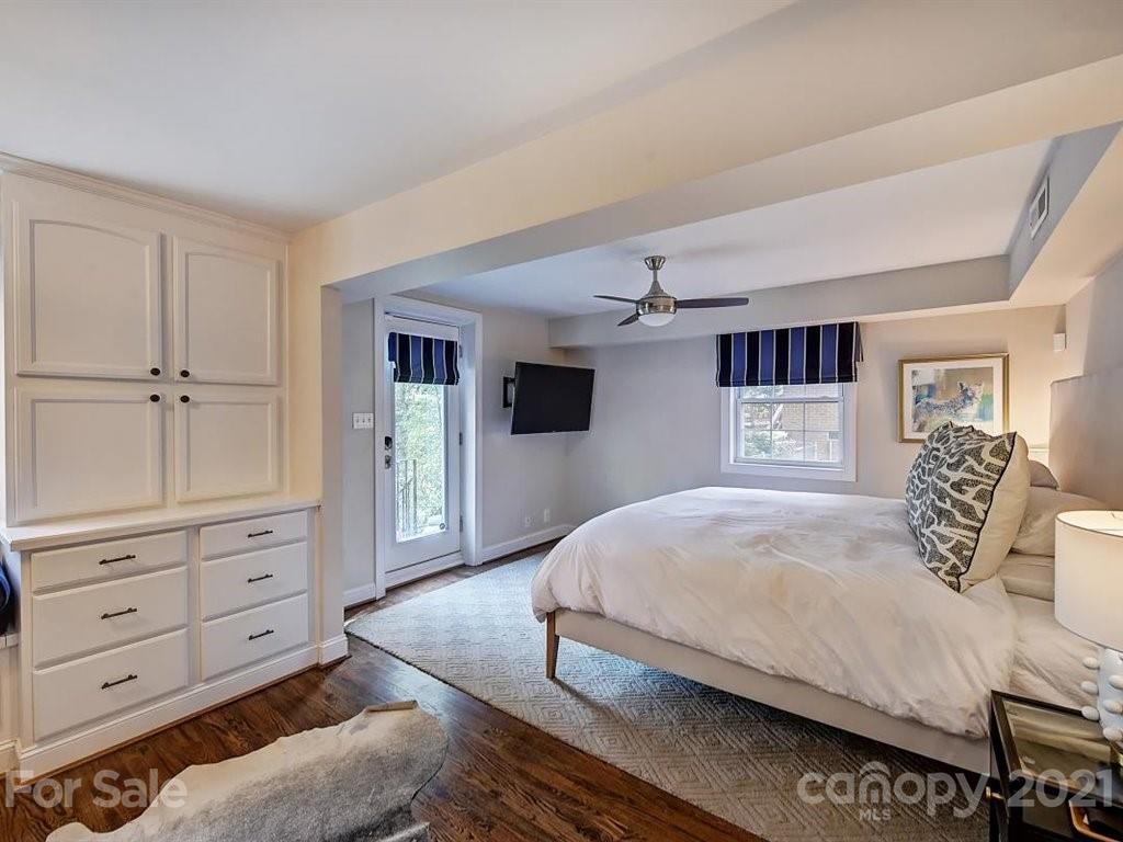 5121 Murrayhill Road Charlotte, NC 28210 - Photo 26 of 47 a bedroom with a large bed and a dresser