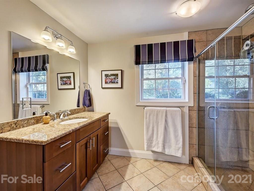5121 Murrayhill Road Charlotte, NC 28210 - Photo 31 of 47 a kitchen with a sink cabinets and window
