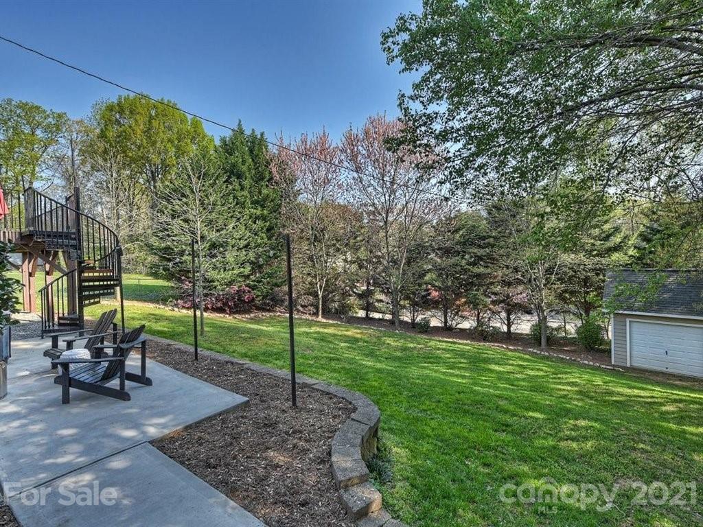 5121 Murrayhill Road Charlotte, NC 28210 - Photo 41 of 47 a view of a backyard with sitting area