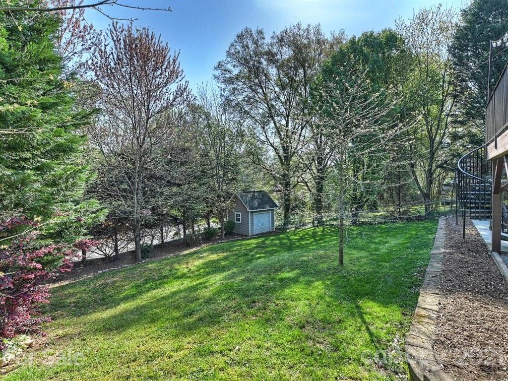 5121 Murrayhill Road Charlotte, NC 28210 - Photo 46 of 47 a view of a backyard with large trees