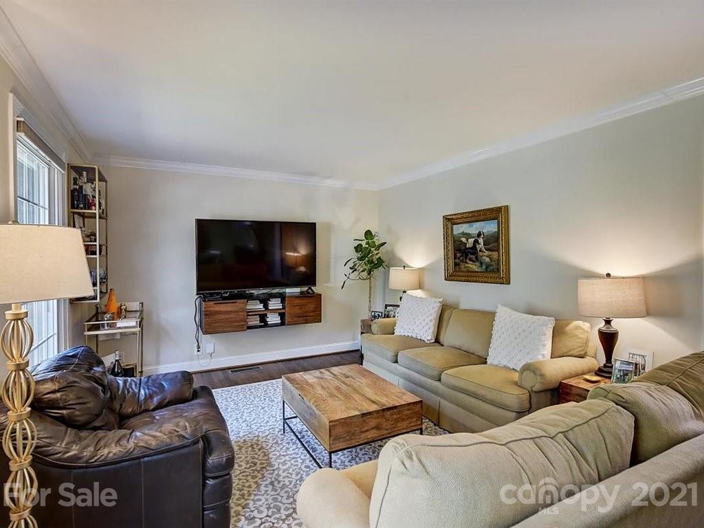 5121 Murrayhill Road Charlotte, NC 28210 - Photo 7 of 47 a living room with furniture and a flat screen tv