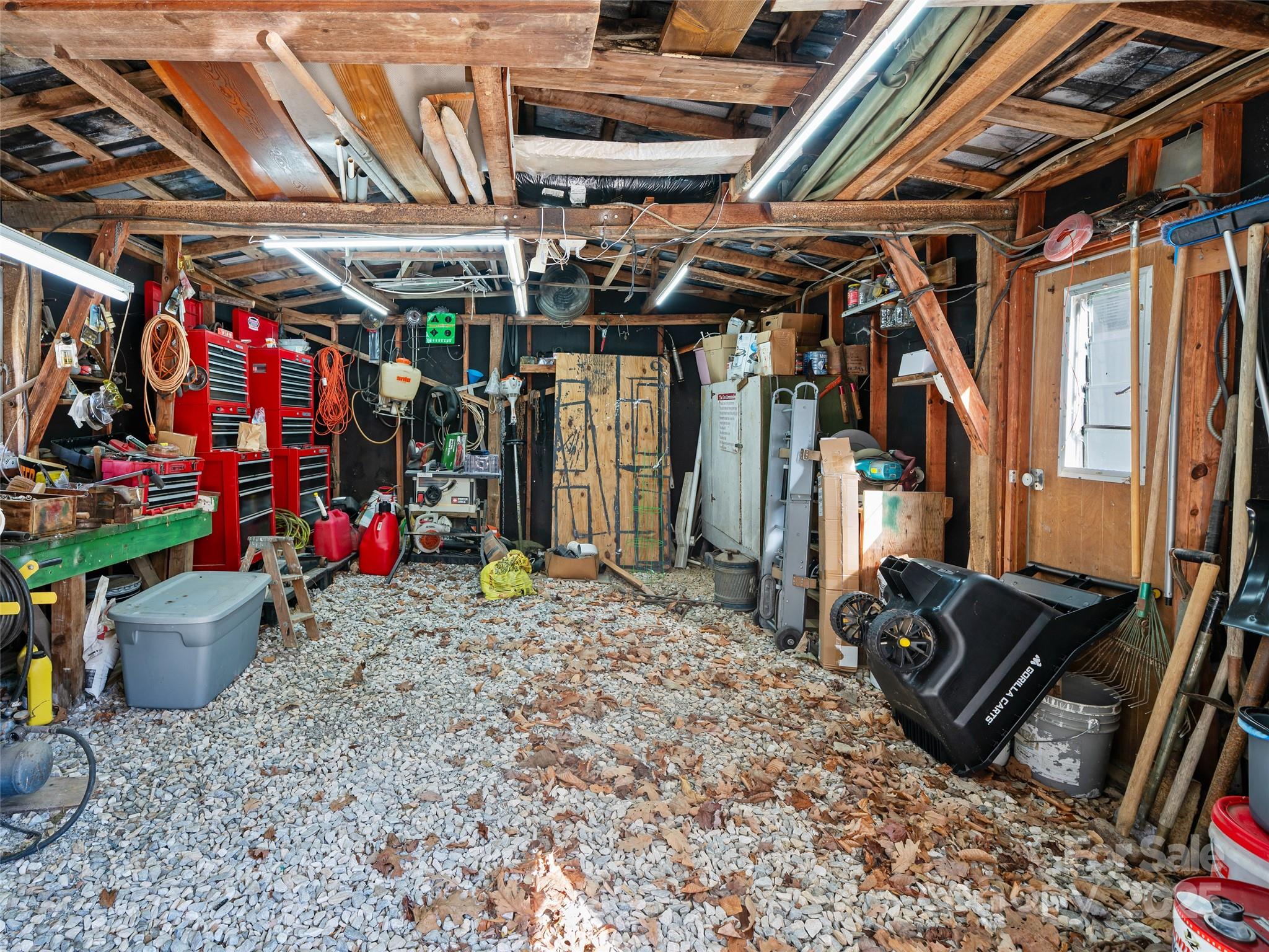 2850 Henson Creek Road Newland, NC 28657 - Photo 22 of 27 a view of a room with storage