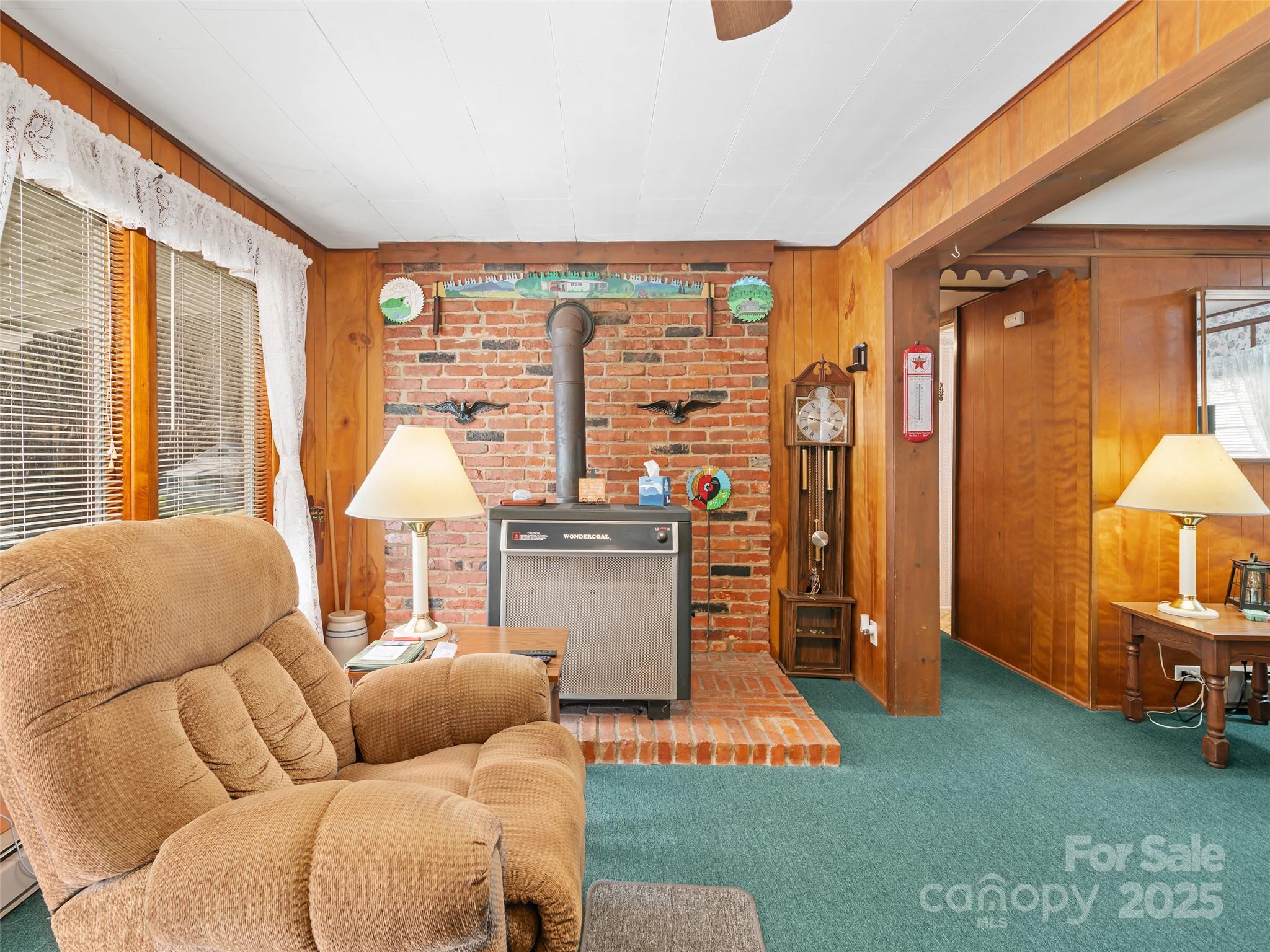 2850 Henson Creek Road Newland, NC 28657 - Photo 4 of 27 a living room with furniture and a large window