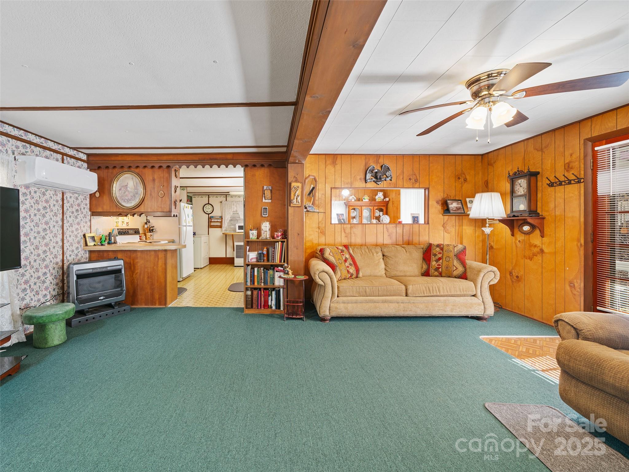 2850 Henson Creek Road Newland, NC 28657 - Photo 6 of 27 a living room with furniture and a large window