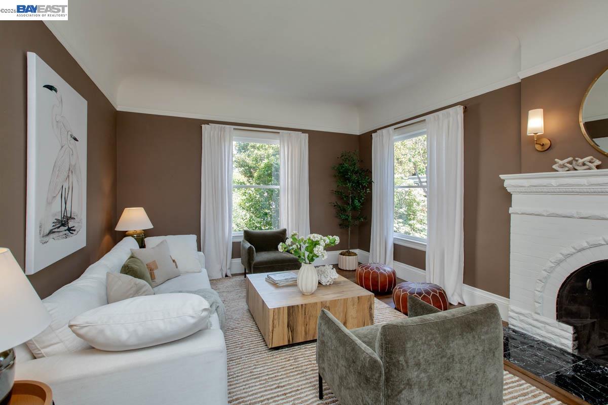 1111 Union Street Alameda, CA 94501 - Photo 15 of 57 a living room with furniture a large window and a fireplace