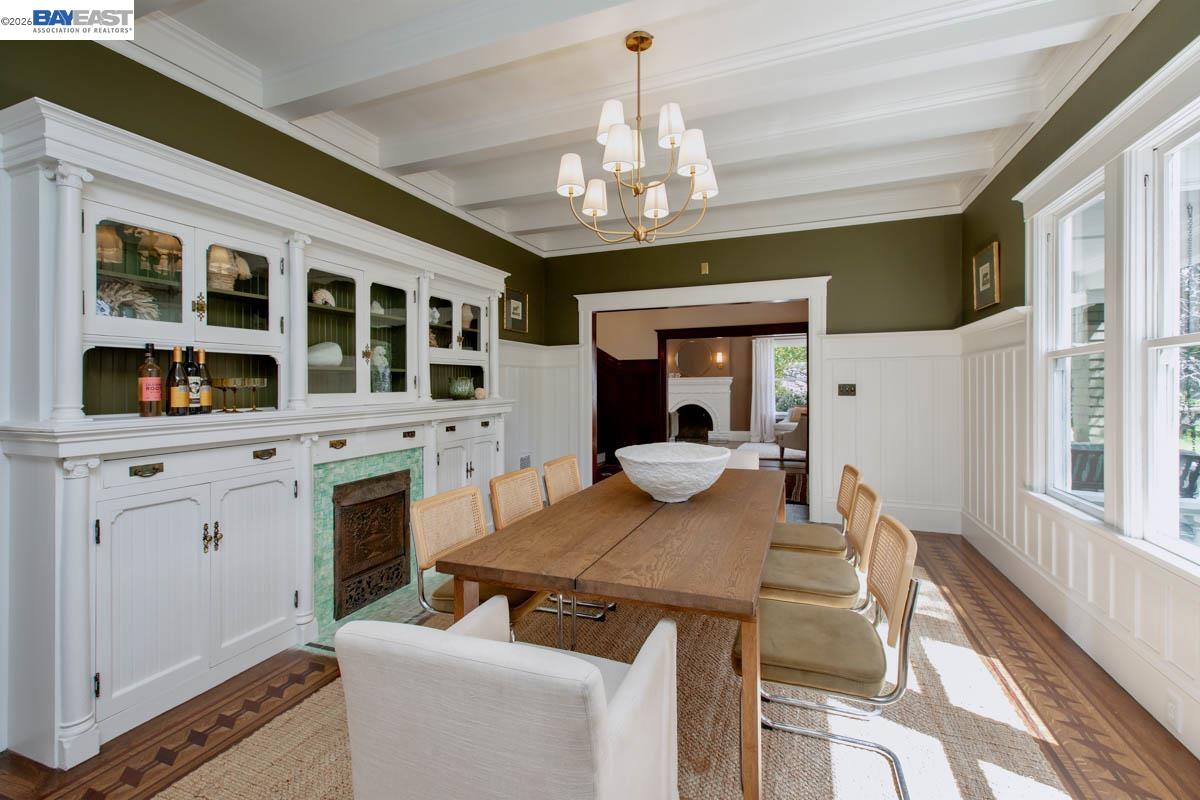 1111 Union Street Alameda, CA 94501 - Photo 18 of 57 a view of a dining room with furniture a chandelier and kitchen view