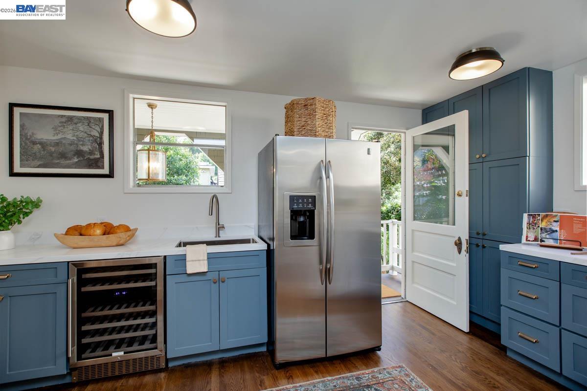 1111 Union Street Alameda, CA 94501 - Photo 26 of 57 a kitchen with stainless steel appliances a refrigerator and a stove