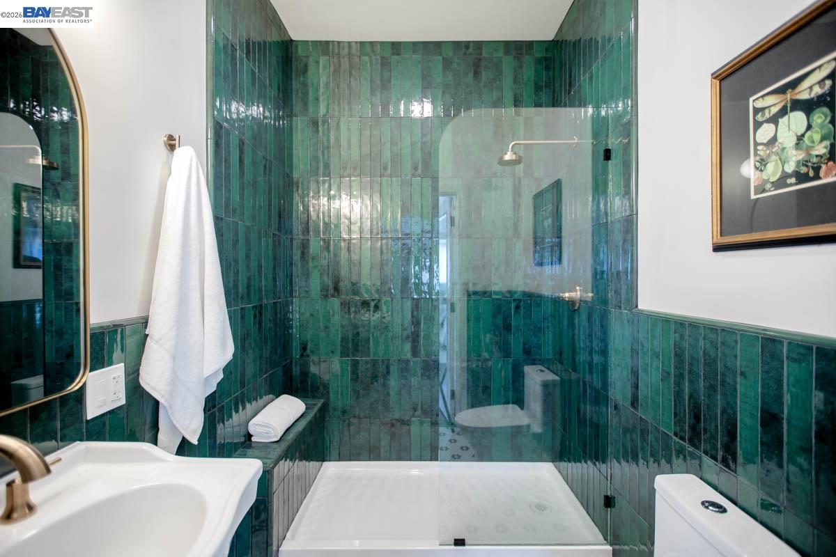 1111 Union Street Alameda, CA 94501 - Photo 38 of 57 a bathroom with a sink a toilet and shower