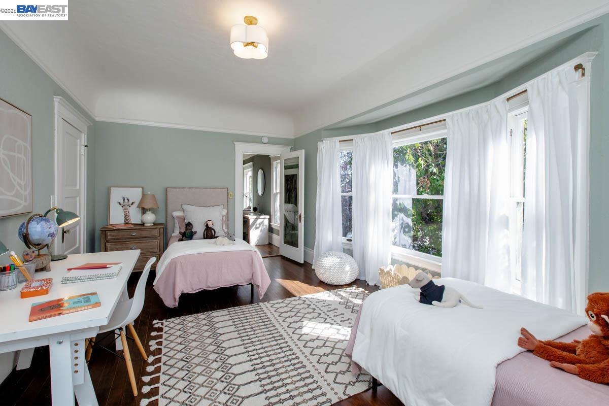1111 Union Street Alameda, CA 94501 - Photo 45 of 57 a bedroom with two beds and a window