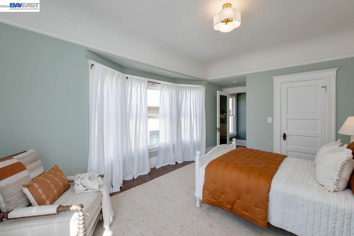1111 Union Street Alameda, CA 94501 - Photo 47 of 57 a bedroom with a bed and a window