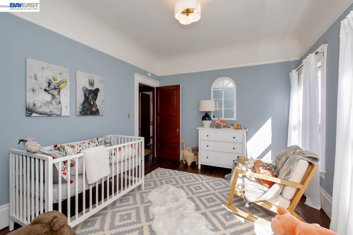 1111 Union Street Alameda, CA 94501 - Photo 48 of 57 a bedroom with furniture and a baby crib