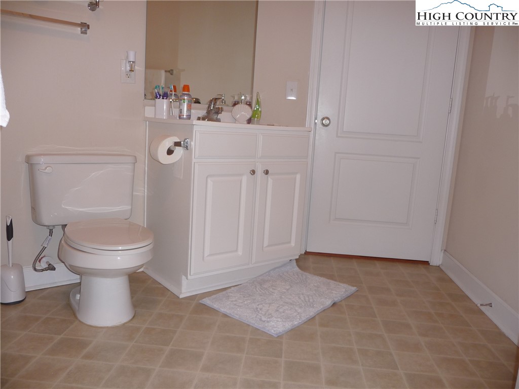 186 Cecil Miller Road, Unit 202 Boone, NC 28607 - Photo 10 of 15 a bathroom with a toilet and a sink