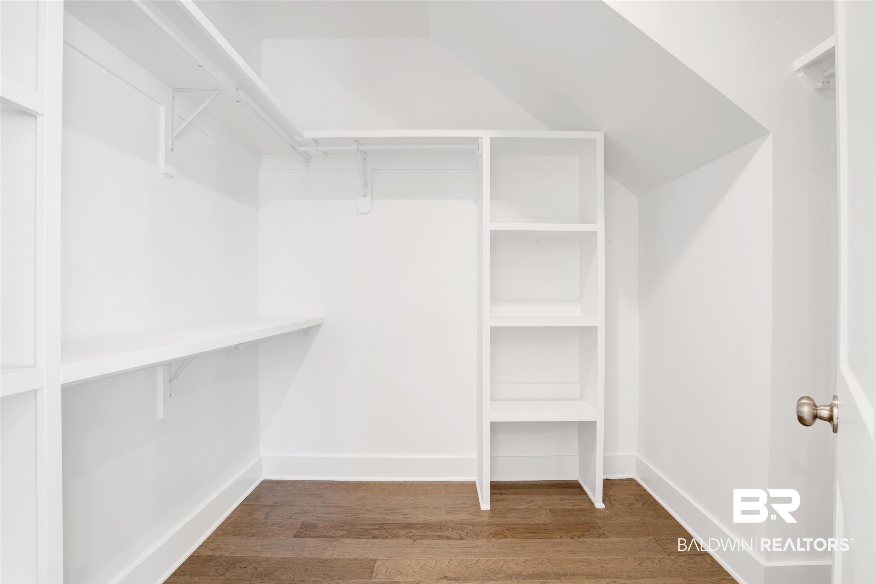 9687 Widgeon Court Daphne, AL 36526 - Photo 23 of 40 Primary closet featuring dark hardwood / wood-style floors
